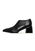 A stylish pair of high-quality leather block heel pumps, perfect for fashionable women.