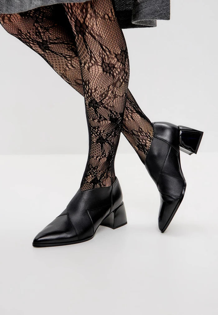 Stylish block heel leather pumps in high quality, fashionable design for women.