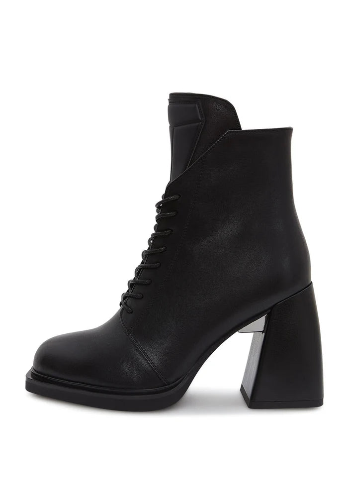 A stylish pair of black leather lace-up ankle boots, also known as Behati black boots, perfect for adding a touch of edge to any outfit.