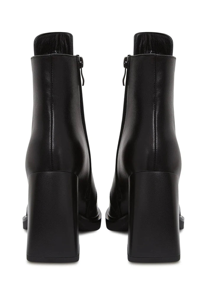 A stylish pair of black leather lace-up ankle boots, known as Behati black boots, perfect for any outfit.