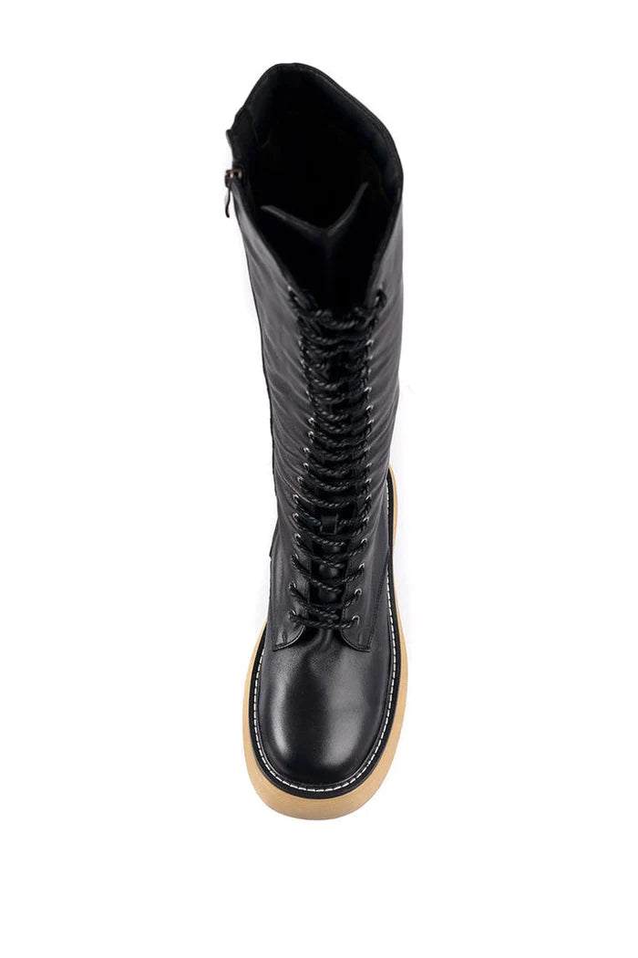 A pair of stylish knee-high lace-up leather boots perfect for any fashionable outfit.