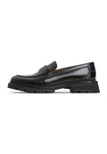 A stylish pair of Mariana black leather loafers with a platform sole, perfect for women's footwear fashion.