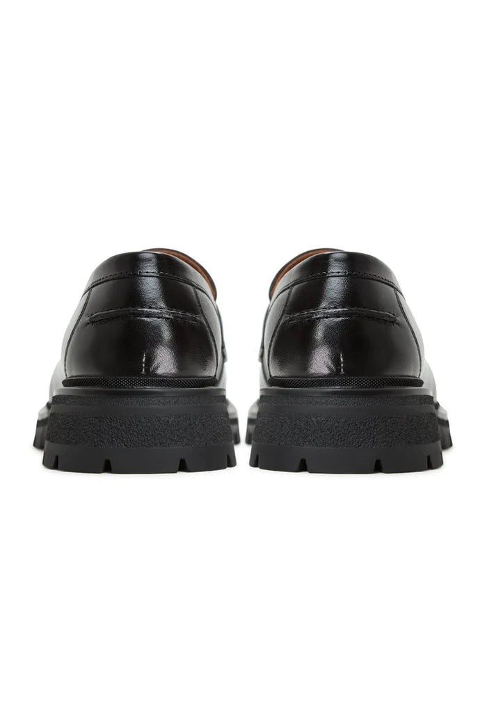 A stylish pair of Mariana black leather loafers with platform soles for women's footwear.