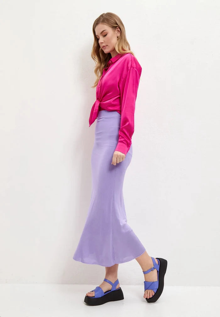 A pair of stylish lilac leather platform sandals for women, perfect for summer days with their high heel and trendy design.