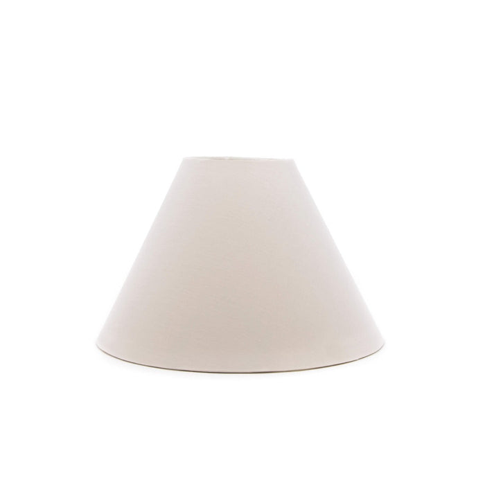 Cream-colored linen empire lamp shade with sloped sides and wide opening.