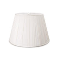White pleated linen lamp shade with tapered cylindrical shape and vertical fold details.