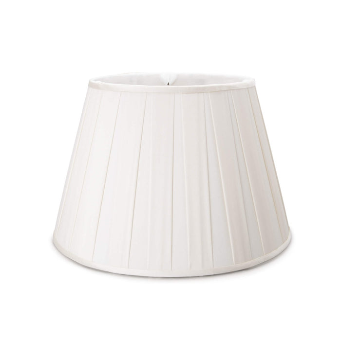 White pleated linen lamp shade with tapered cylindrical shape and vertical fold details.