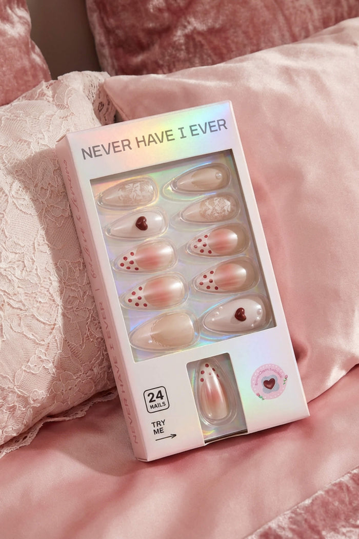 LOVER GIRL almond press-on nails set with floral and heart designs. Includes 24 nails, glue, and tools.
