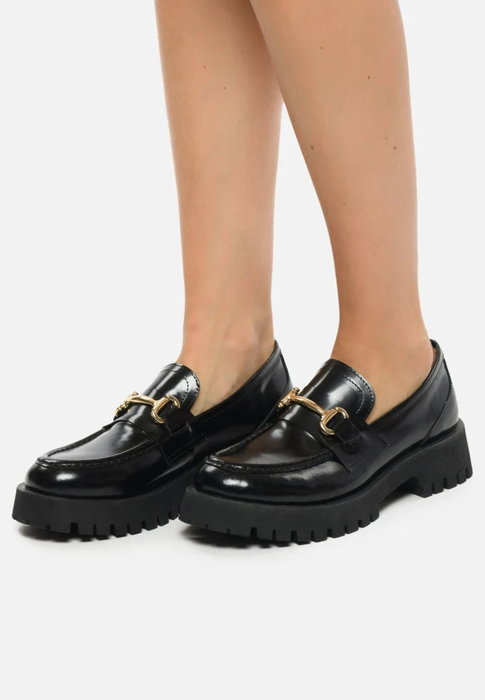 A stylish collection of luxe glide gold-bit loafers, Josephine black loafers, and luxe glide black shoes, perfect for women who love black loafers with a touch of gold.
