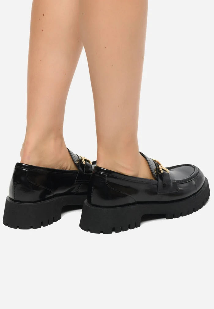 Step out in style with these Luxe Glide Gold-Bit Loafers and Josephine Black loafers, the perfect mix of elegance and comfort. Elevate your look with these chic Gold-Bit Loafers and Luxe Glide Black shoes, a must-have for any wardrobe. Classic and versatile black loafers for women.