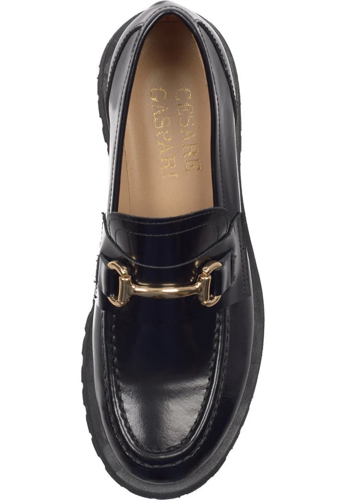 A stylish collection of luxe glide gold-bit and Josephine black loafers, including gold-bit loafers and luxe glide black shoes, perfect black loafers for women.
