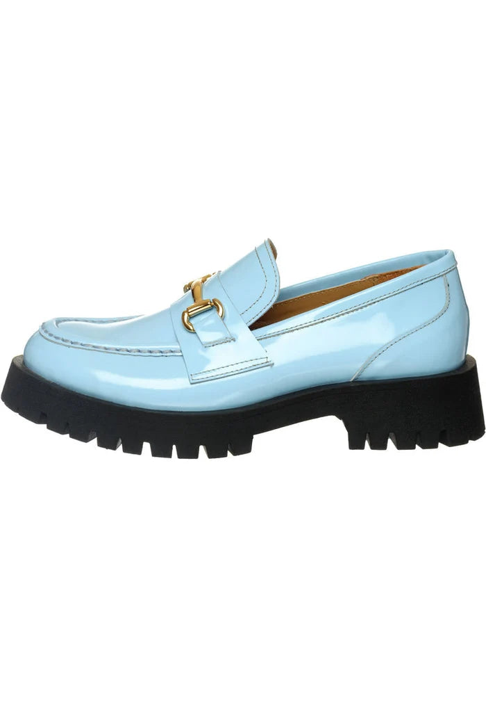 A chic and stylish pair of Luxe Glide Gold-Bit Loafers in Josephine Blue, the perfect blend of sophistication and comfort for those looking for a touch of elegance in their wardrobe.