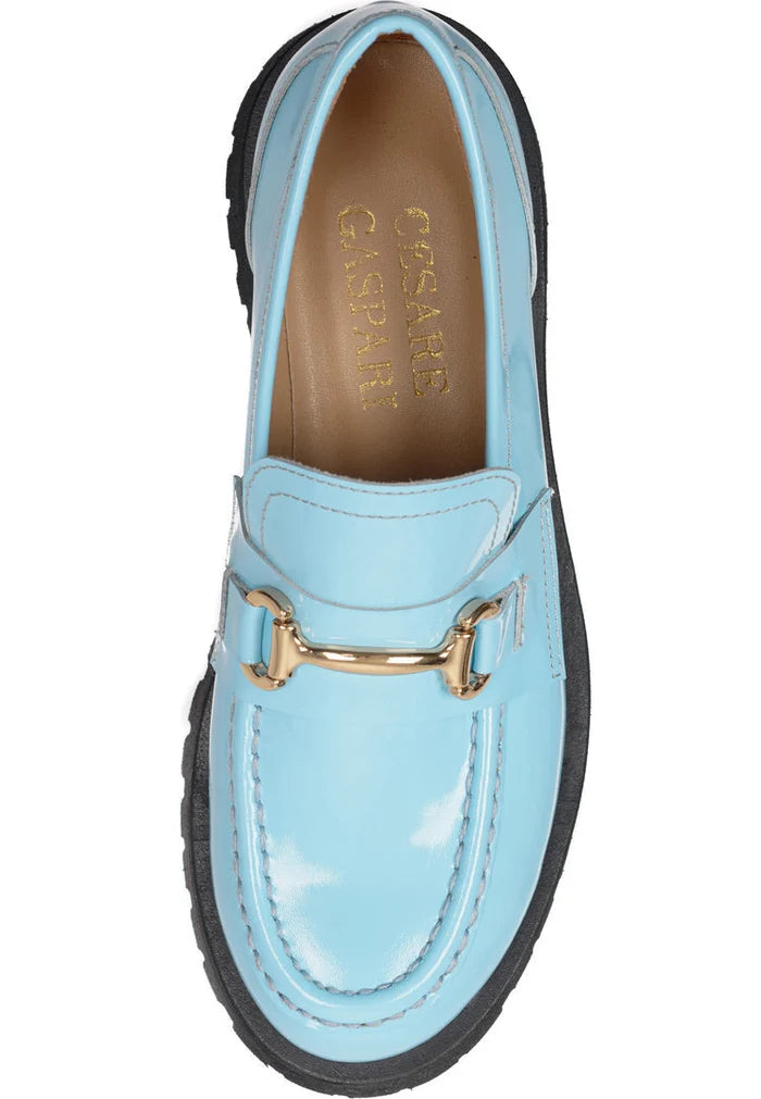 Step out in style with these luxurious Josephine Blue loafers featuring gold-bit detailing. Elevate your look with these luxe footwear - Blue loafers never looked this sophisticated!