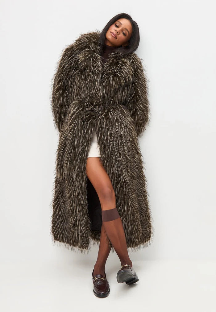 A stunning brown designer faux fur coat that exudes luxury and elegance.