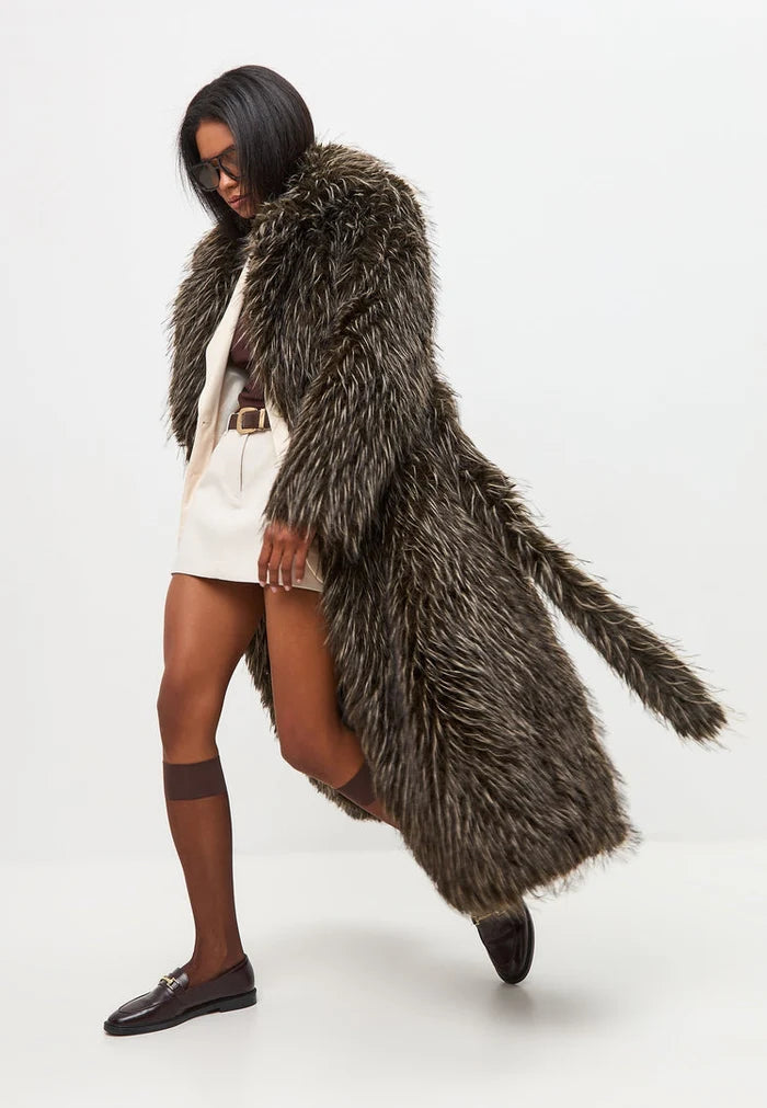 A stylish and elegant brown faux fur coat from North, perfect for those seeking a luxurious and high-end designer look.