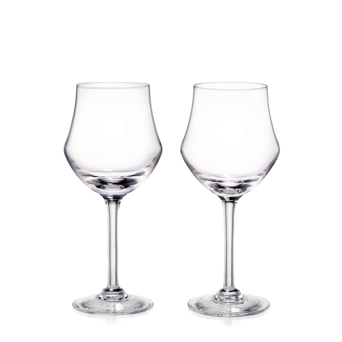 Two clear glass wine glasses with tulip-shaped bowls and long stems on white background.