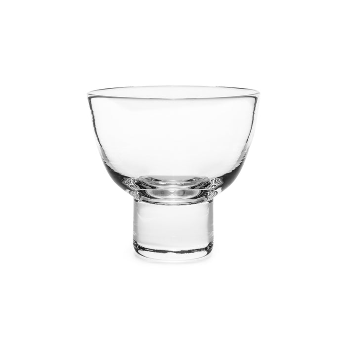 Clear glass martini glass with wide bowl and narrow pedestal stem.