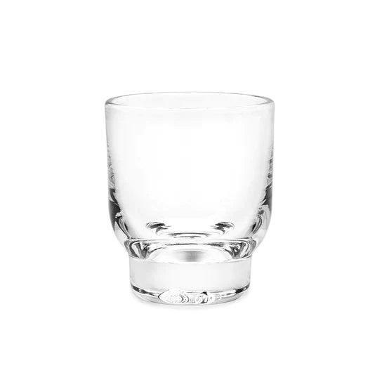 Clear glass tumbler with tapered cylindrical body and thick weighted base.