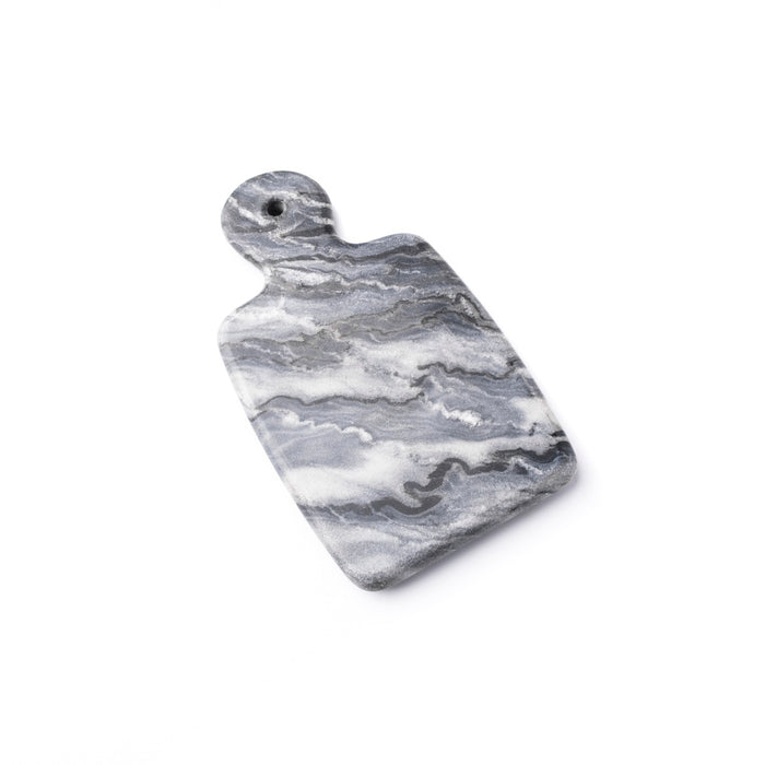 Grey marble board with veined pattern and rounded handle on top.