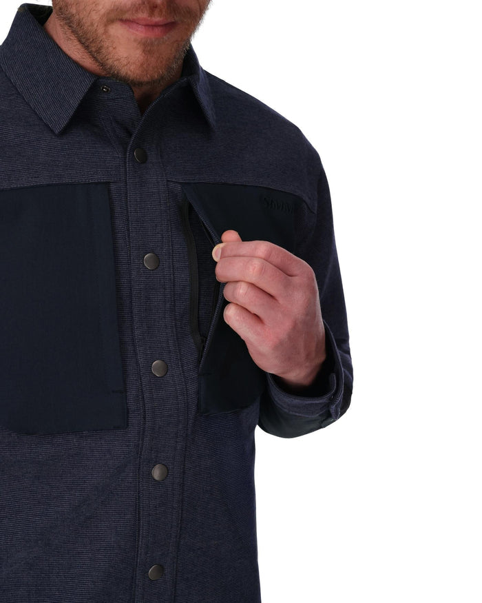 Man wearing a dark blue jacket with a white background
