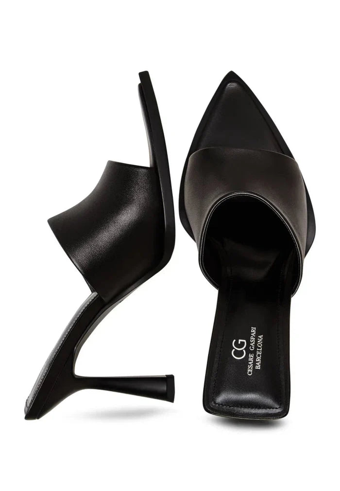 A pair of stylish black heeled mules for women, showcasing a minimalist design in footwear fashion.