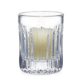 Clear crystal hurricane candle holder with vertical ribbed pattern and cream-colored pillar candle inside.