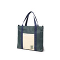 Quarter View of Topo Designs Mountain Essential Tote in "Forest / Bone White"