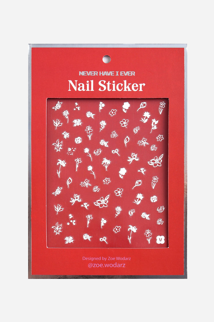 White floral nail stickers by Zoe Wodarz. Delicate flower & leaf designs on red backing.