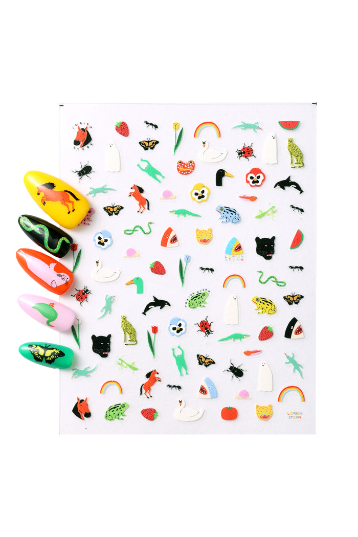 Sheet of Natural World nail stickers featuring animals, fruits, and nature elements by Lorien Stern.