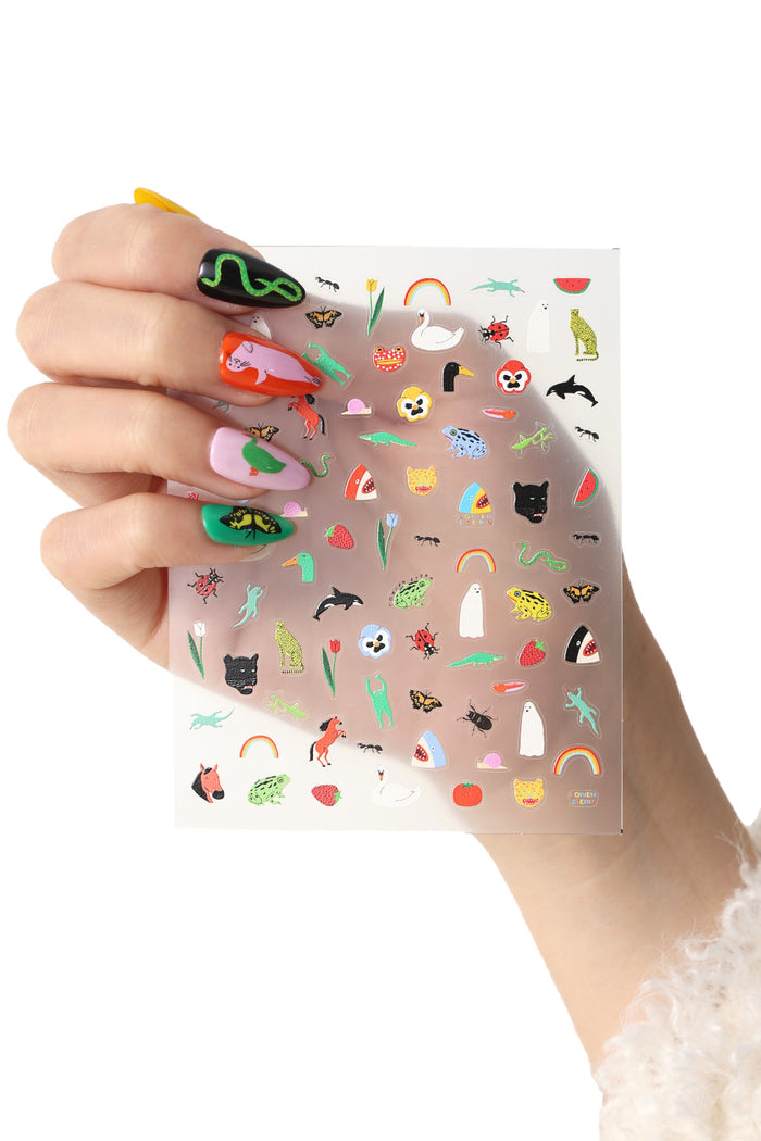 Sheet of Lorien Stern Natural World nail stickers featuring animals, insects, and nature designs.