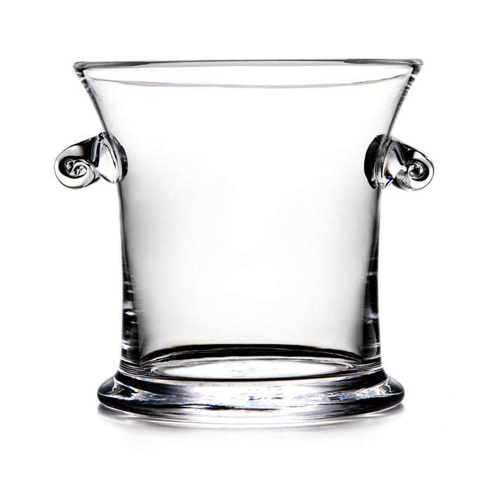 Clear glass ice bucket with decorative scrolled handles on each side.