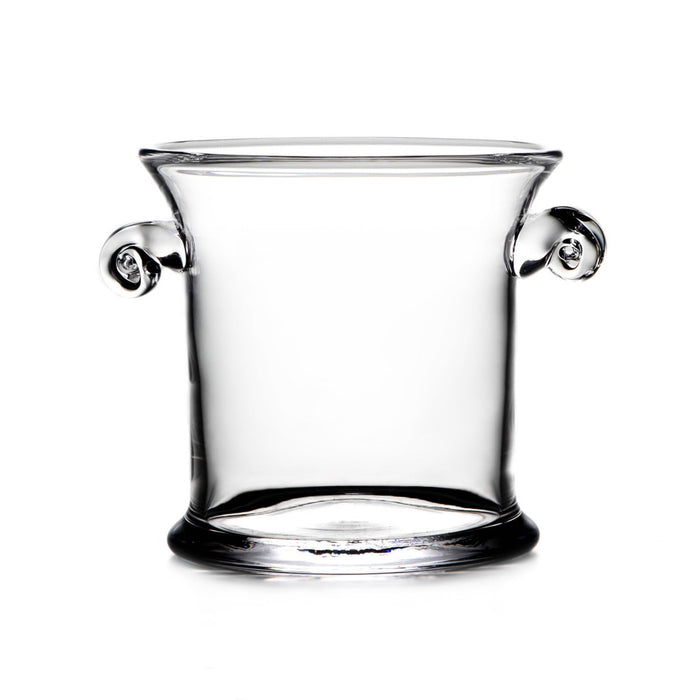 Clear glass ice bucket with decorative scrolled handles on each side and a thick base.