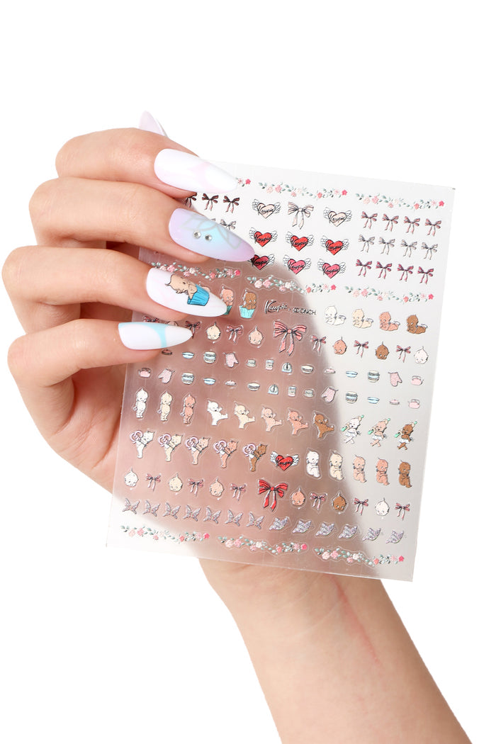 Onch x Kewpie nail stickers sheet with cute baby, bow, and heart designs.