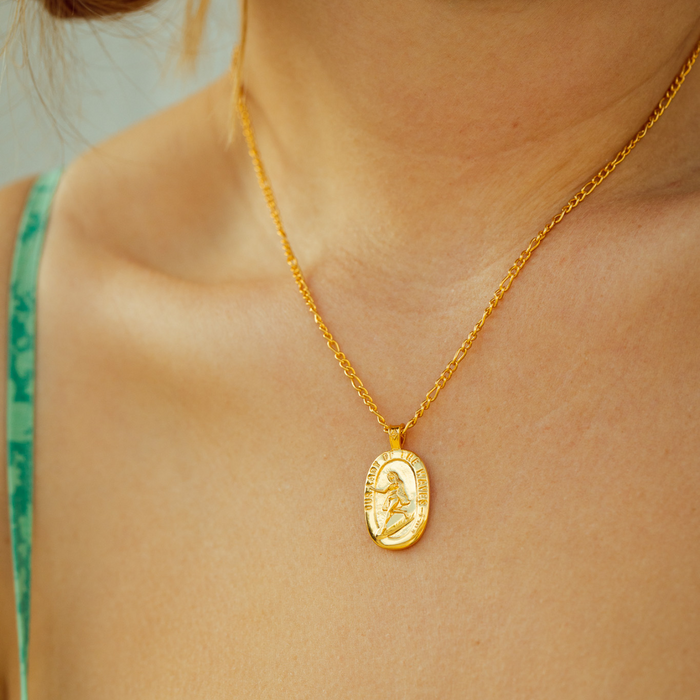 gold lady of the waves necklace close up