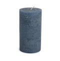 Cylindrical pillar candle in lupine blue with a textured surface and single wick on top.