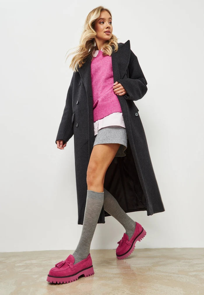 A stylish pair of fuchsia platform loafers by Ksenia, the perfect trendy shoes for women's footwear.