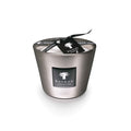 Platinum-colored cylindrical candle with black label, lid, and black ribbon bow from Baobab Collection.