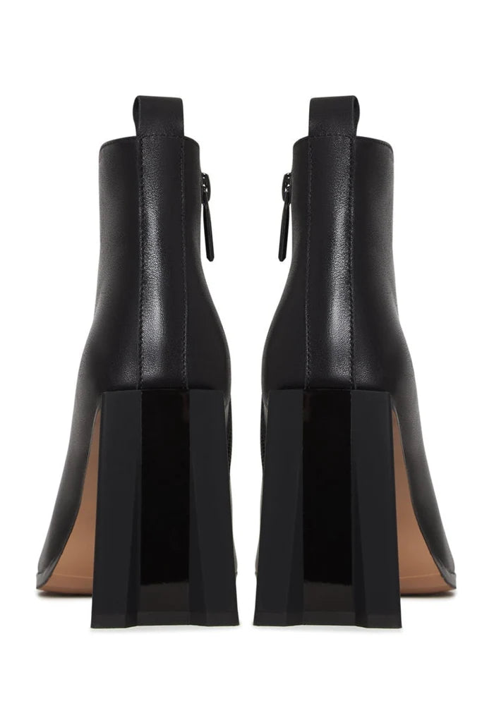 A stylish pair of black leather pointed toe ankle boots with block heels.