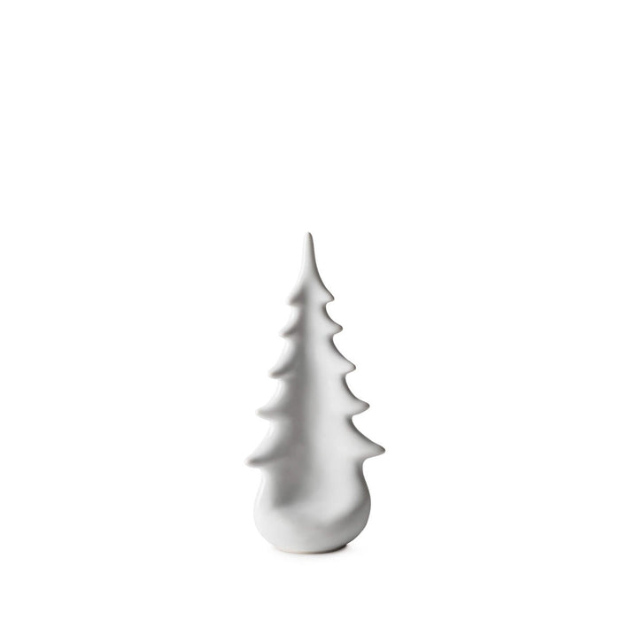 White ceramic evergreen tree figurine with pointed branches and rounded base.