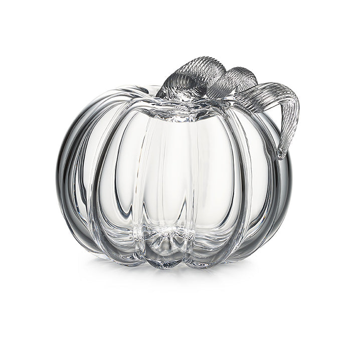 Clear glass pumpkin-shaped container with ridged sides and twisted stem handle.