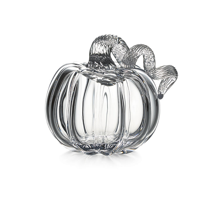 Clear glass pumpkin-shaped container with ridged body and twisted handle on top.