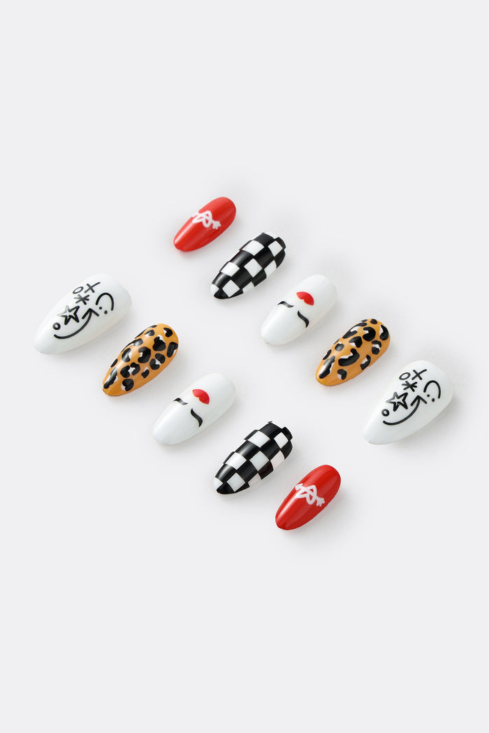 Retro Rock ‘n’ Roll press-on nails with leopard print, checkerboard, and doodled faces.