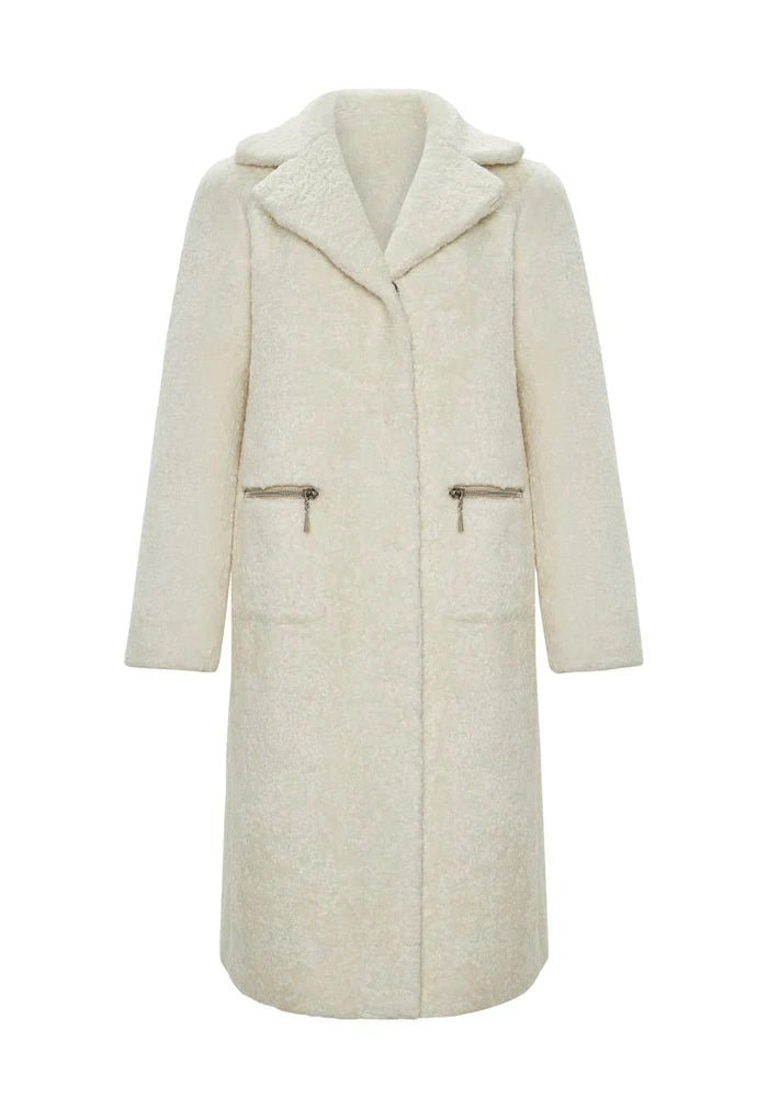 A fashionable white reversible printed coat with a trendy catty print design for women, perfect as a statement fashion outerwear piece.