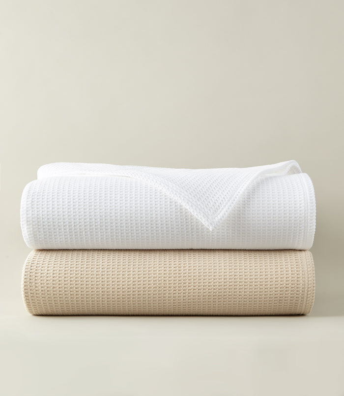 Stack of Riviera Blanket White Linen