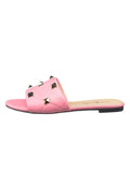 A fashionable pair of pink Rockstud sandals, known as the Mila sandals, which are designer shoes featuring edgy stud detailing.
