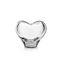 Clear glass vase with heart-shaped design and curved opening at top.