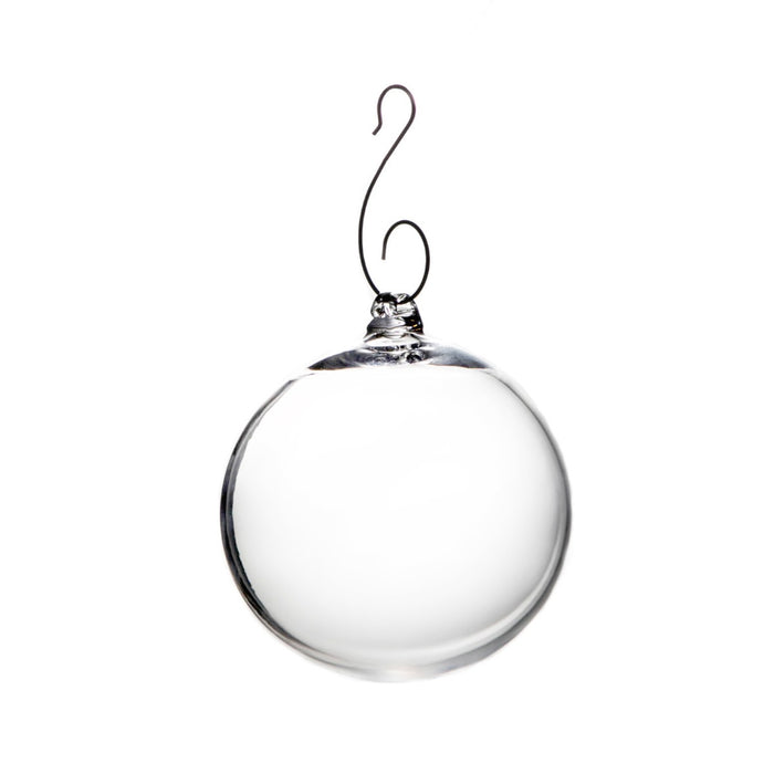 Clear glass round ornament with metal hook and silver cap for hanging.