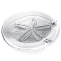 Clear glass platter with embossed sand dollar design and two shell-shaped handles.