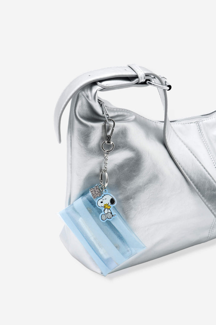 Peanuts Faux Nail Fix-It Kit with Snoopy charm on silver bag
