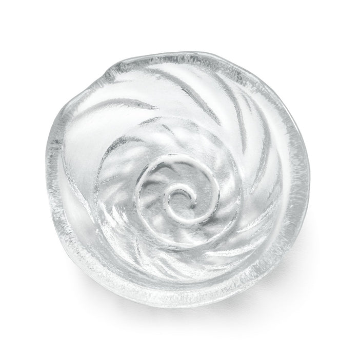 Small white bowl with spiral shell relief pattern molded into the interior surface.
